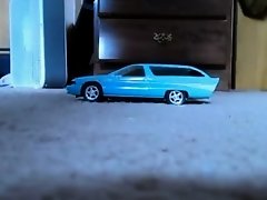 barefoot girl crush blue model car on Watchteencam.com