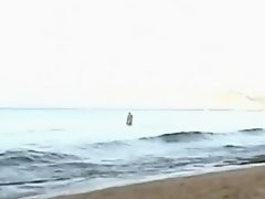 Couple Fucks in the Water at the Beach on Watchteencam.com