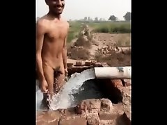 Desi Guy Bathing Fully Naked in A village Outdoor Tubewell on Watchteencam.com