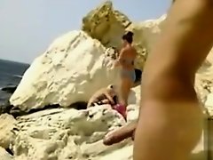 Hard cock exposed to bikini girls at the beach on Watchteencam.com