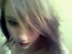 girl with pierced nipples plugs her pussy and ass with a toy on the floor on Watchteencam.com
