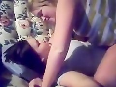 Homemade video with two cute lesbians making out on a sofa on Watchteencam.com