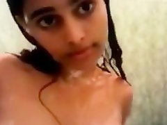 Amateur exotic beauty films herself while taking a shower on Watchteencam.com