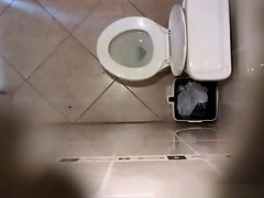 Hidden cam in public toilet ceiling on Watchteencam.com