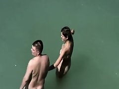 Adorable woman has steaming hot sex in the water on Watchteencam.com